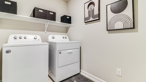 Utility room with washer and dryer connection