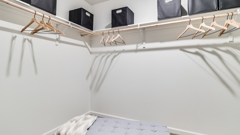 Walk-in closet with hanging rods