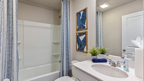 Second full bathroom with sink and bathtub