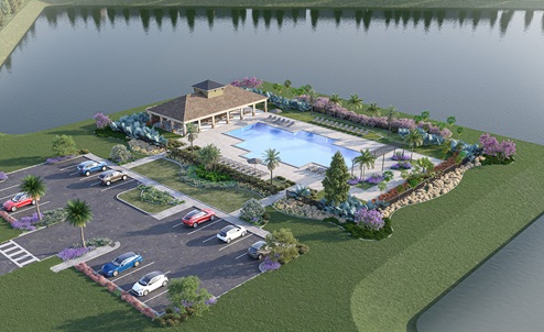 Arial shot of Amenity, including parking and pool surrounded by lake.
