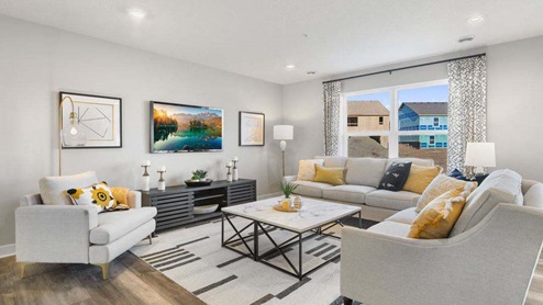 Family room with hard flooring throughout.